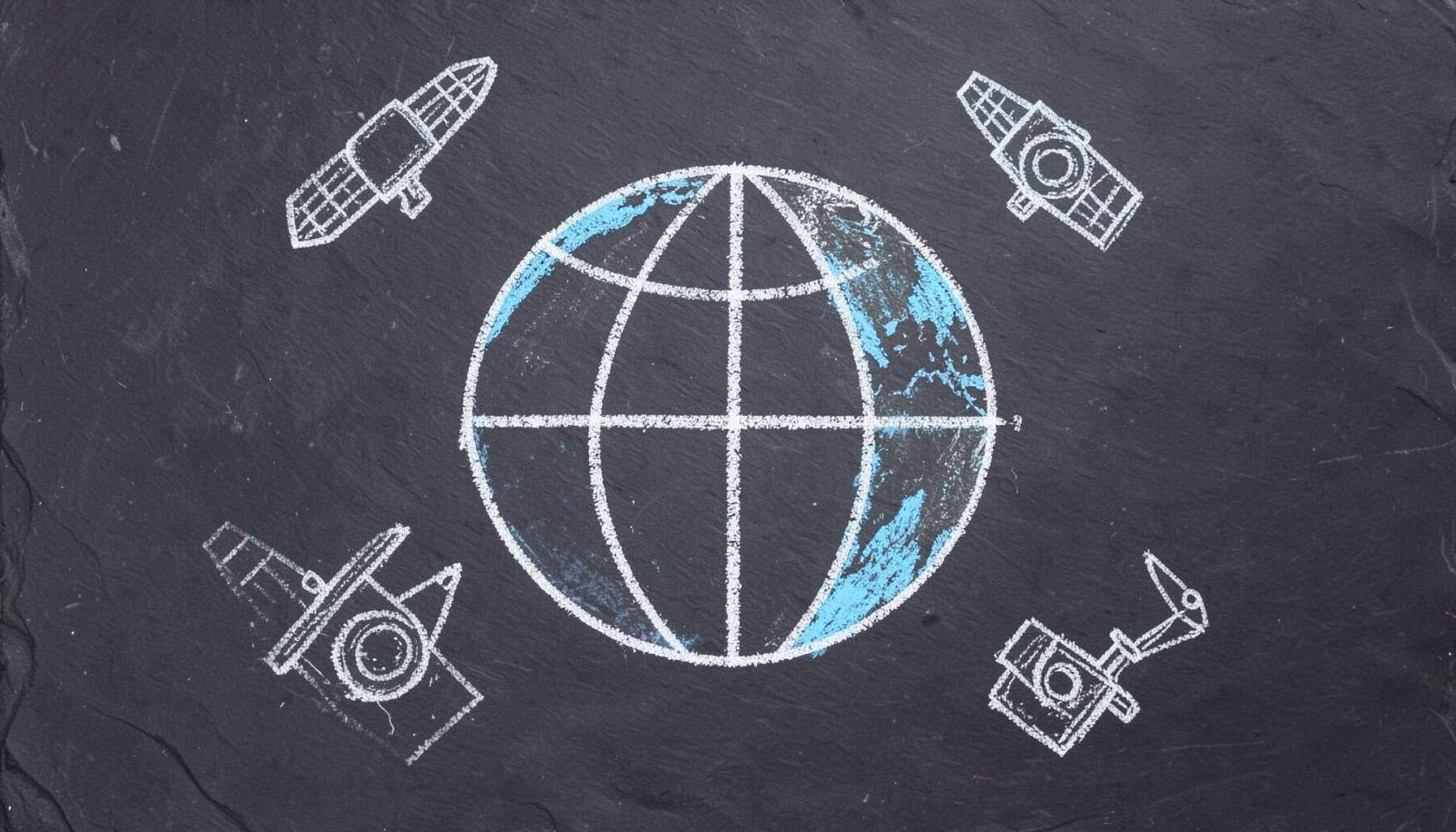 Chalk-drawn globe with latitude and longitude grid on dark slate