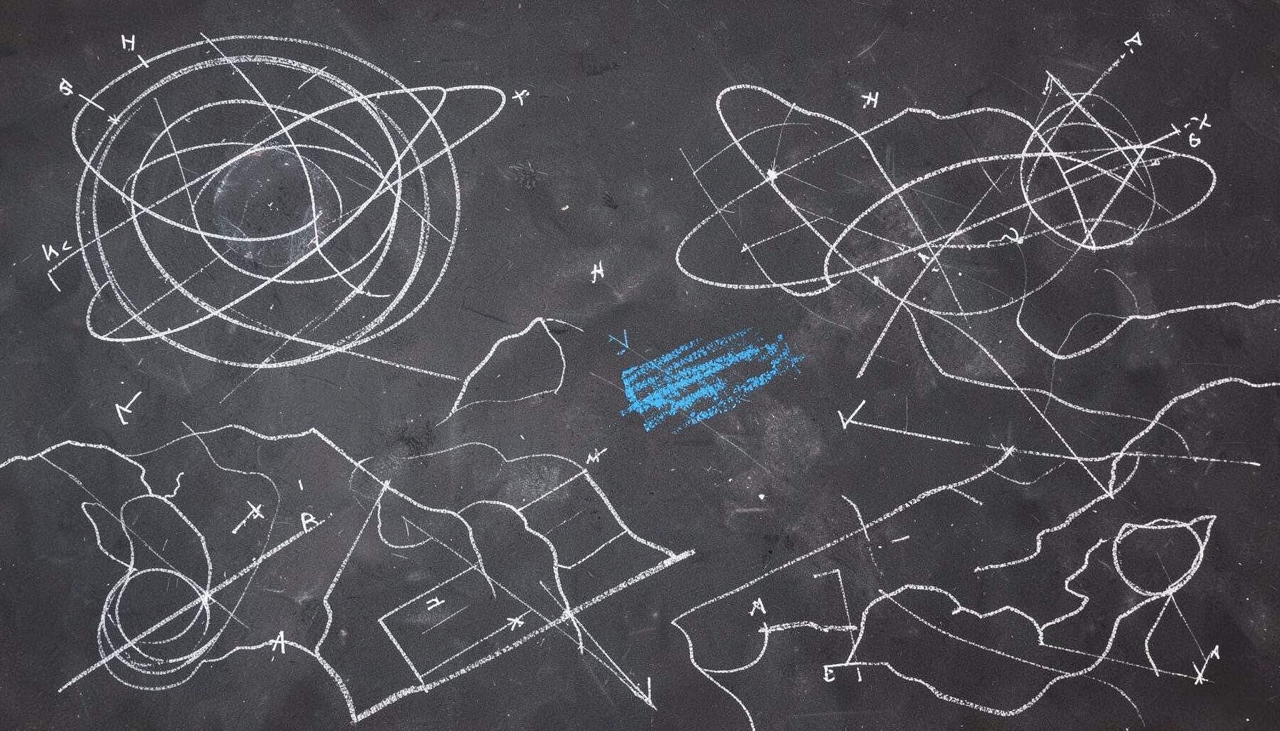 A dark slate chalkboard covered with hand-drawn white chalk diagrams of satellite orbits, terrain contour lines, and geodetic survey marks